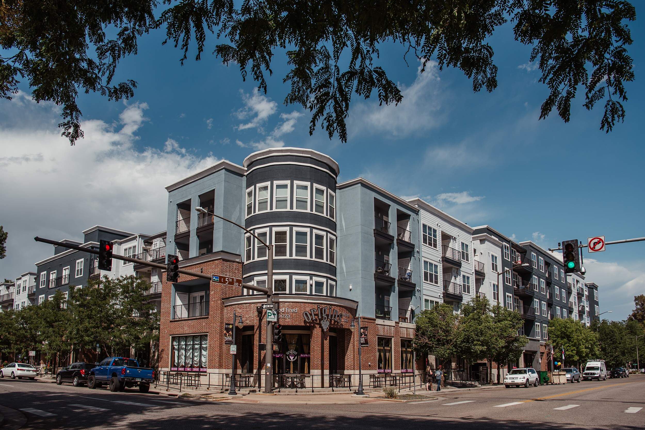 Wide shot of the exterior of a multifamily apartment complex