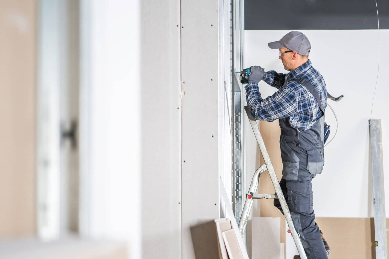 Pro Construction Site Contractor Worker Building Drywall Walls. Interior Finishing.