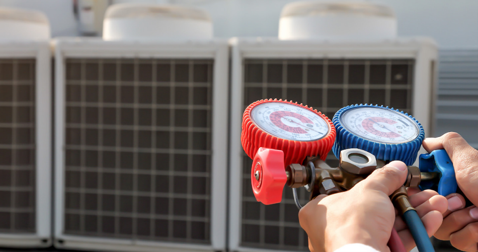 Man adjusting HVAC system